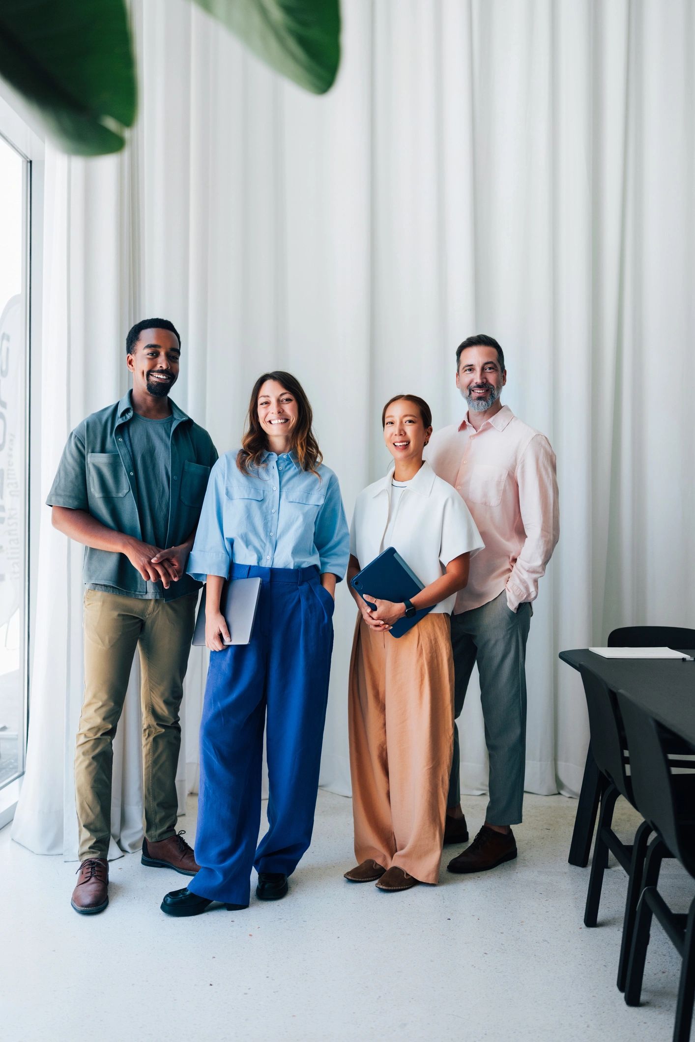Diverse business team collaborating together in a modern office